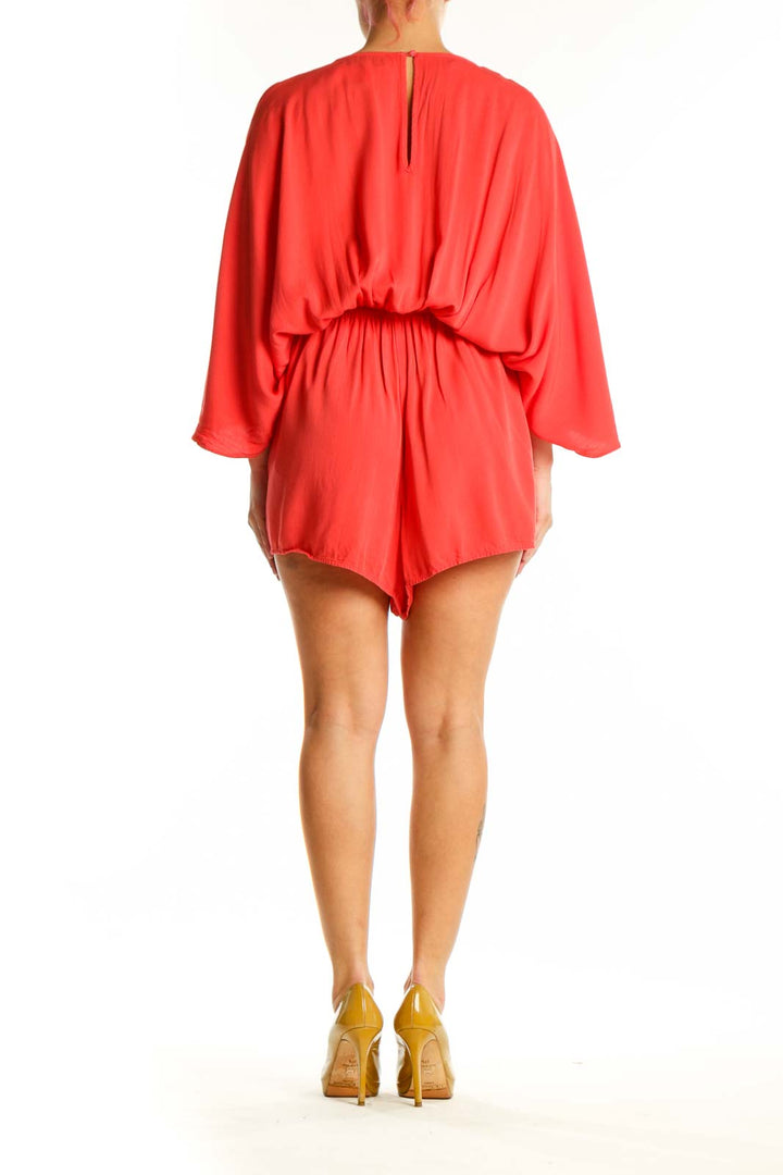 Red rayon bubble hem romper with draped back detail, back view