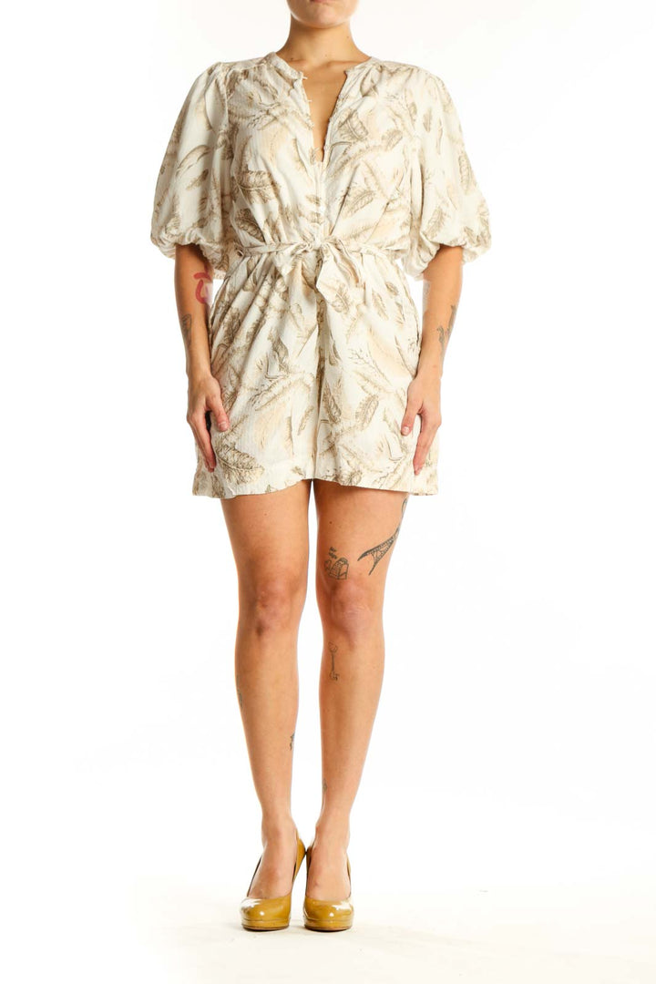 Cream floral print puff sleeve romper with wrap-front tie waist, front view