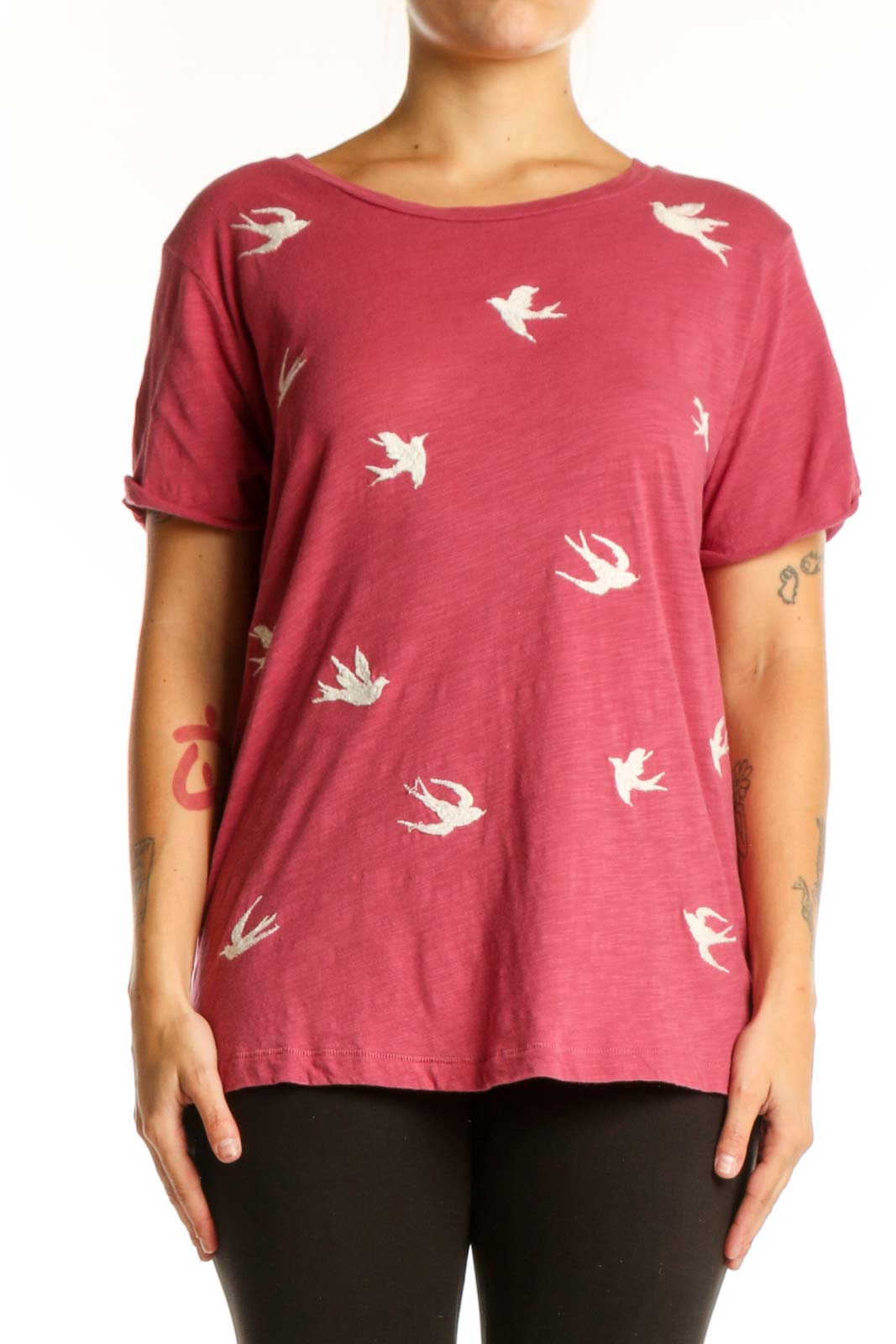 Burgundy short-sleeve tee with white bird print, front view on model