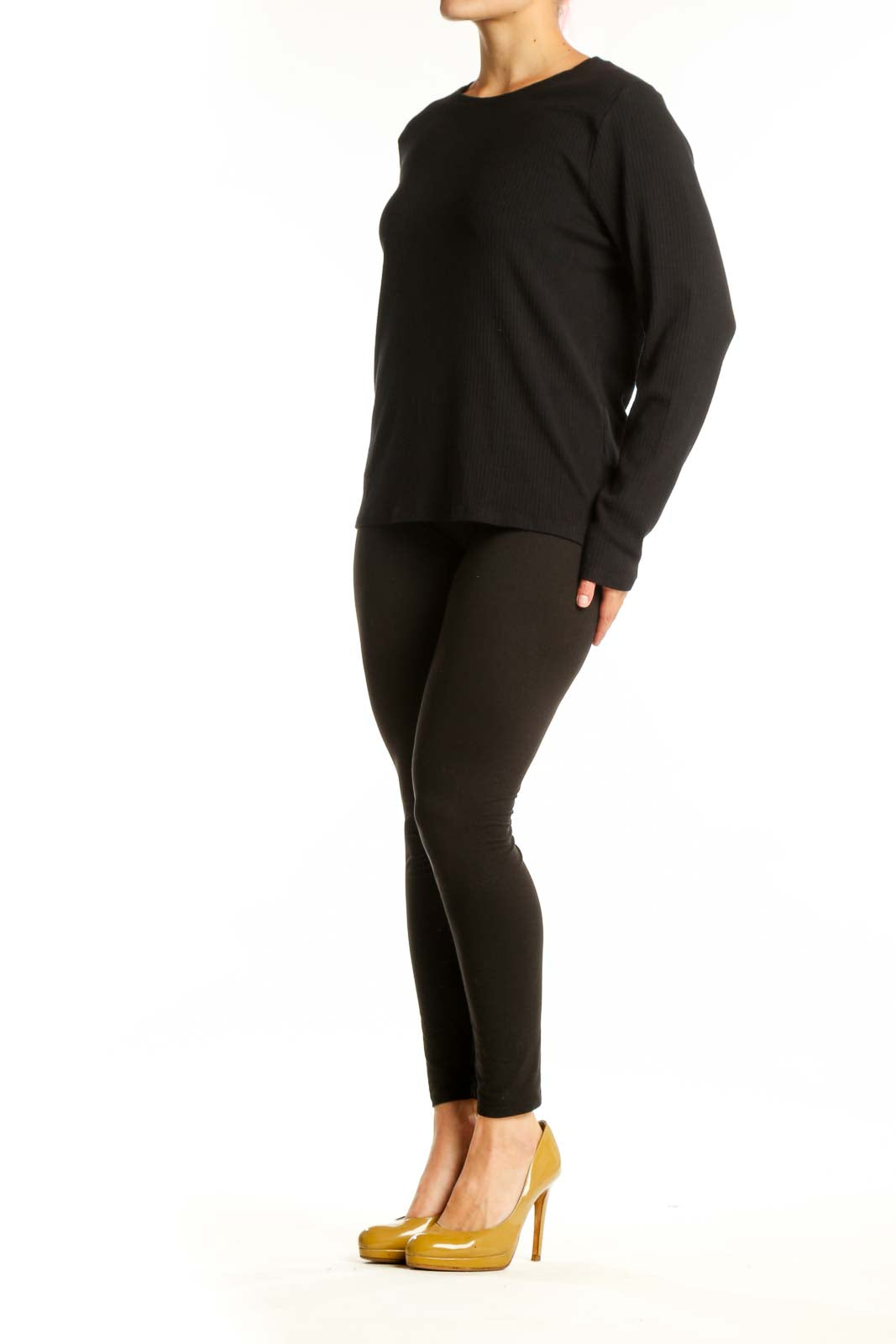Black ribbed knit long sleeve top with crew neckline, front view on model