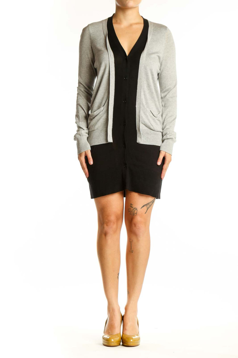 Gray and black BCBG MaxAzria cardigan with button-front closure and pockets, worn on model from front view