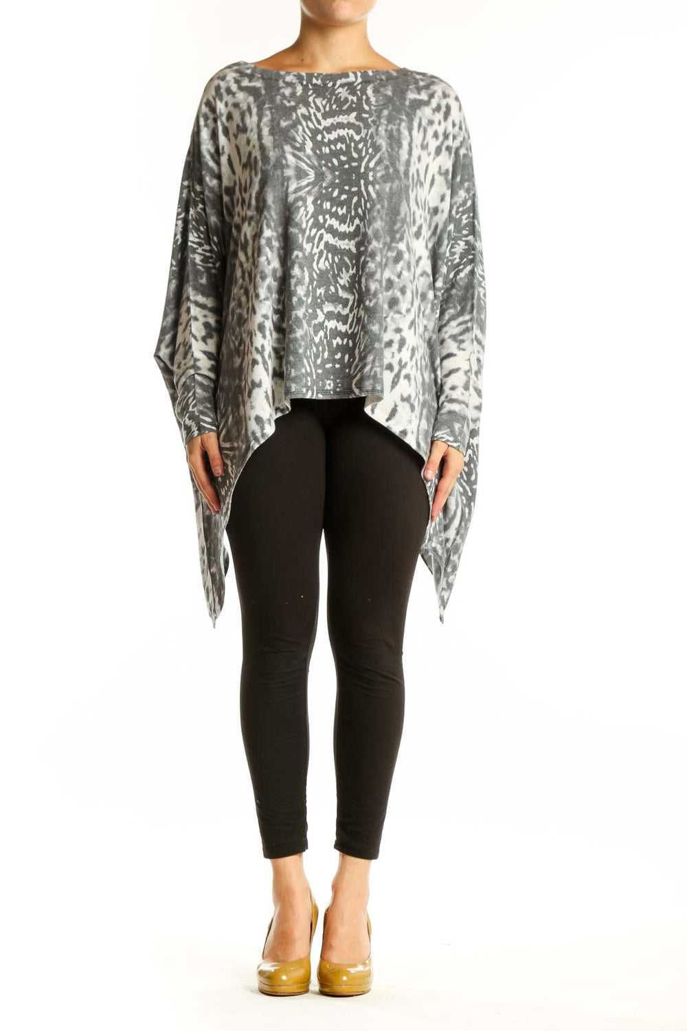 Gray and cream animal print asymmetrical knit top with long sleeves and oversized fit, front view