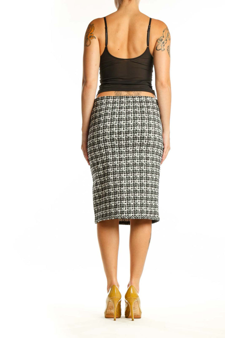 Black and white houndstooth tweed pencil skirt back view, showing fitted silhouette by Max Studio