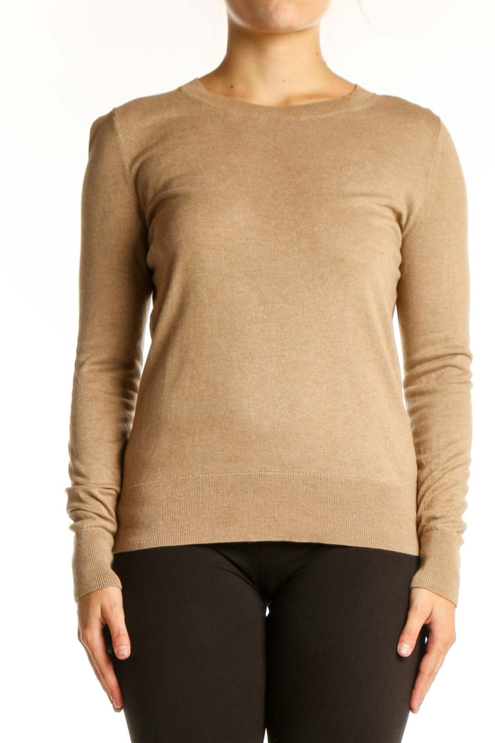 Beige cashmere silk crew neck sweater front view on model