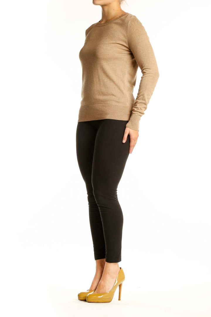 Beige cashmere silk crew neck sweater front view on model