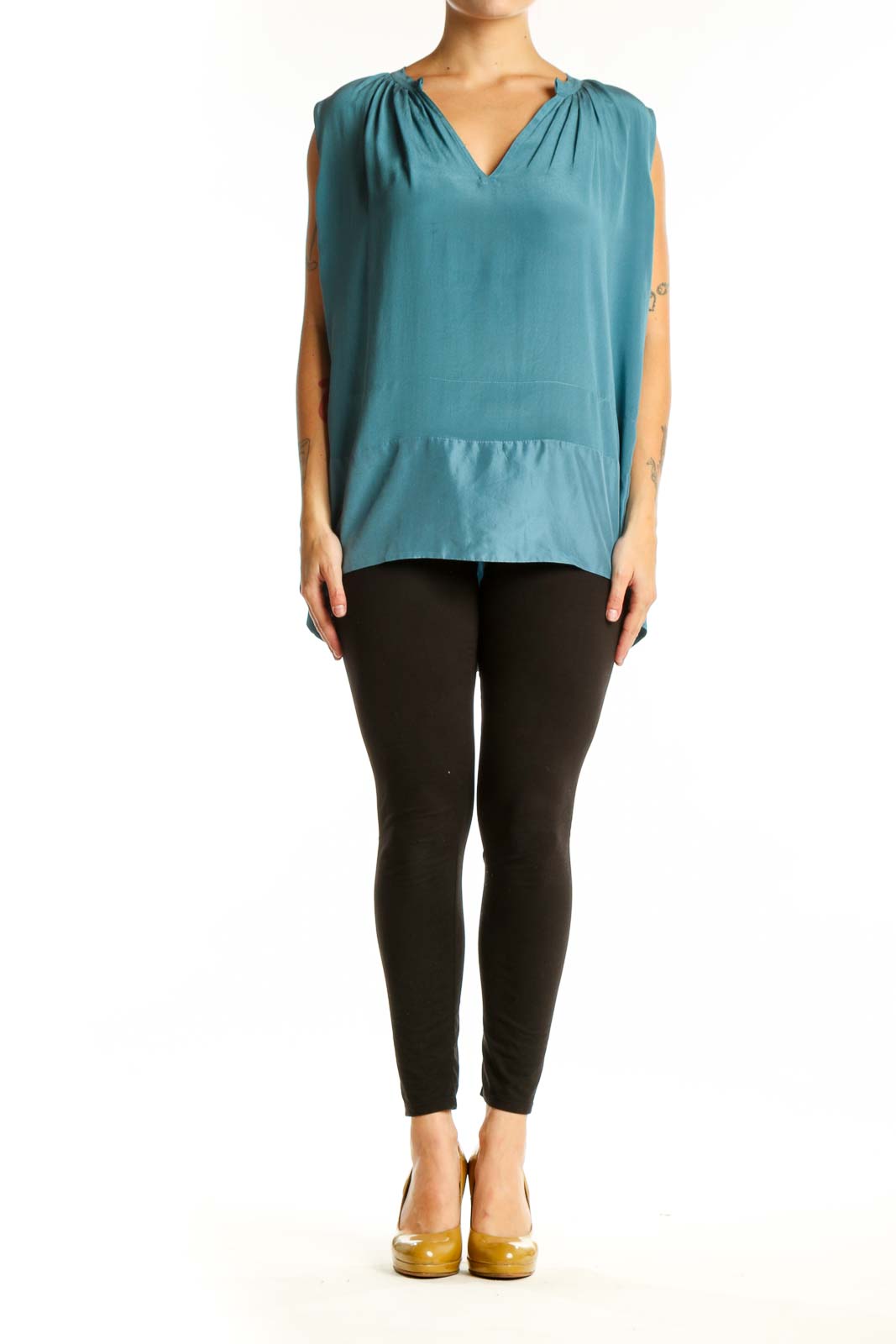 Teal sleeveless top with V-neckline and ruched shoulders, front view on model