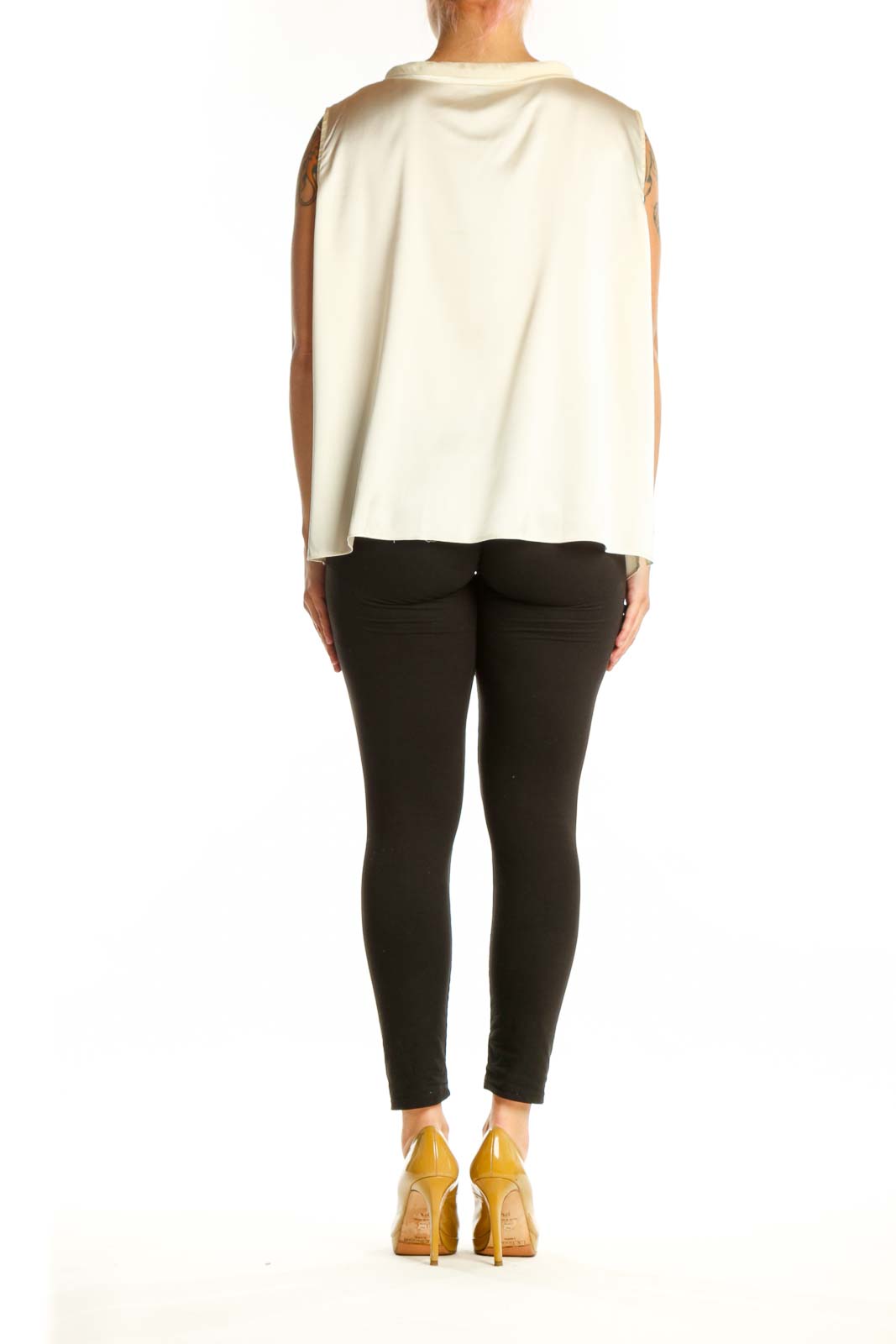 Cream silk sleeveless top back view, showing relaxed fit and center placket detail