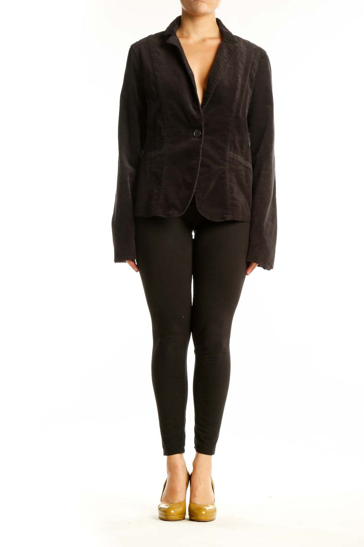 Black corduroy blazer with single button closure and notch lapels, front view