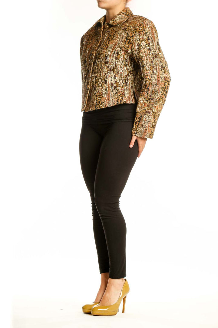 Gold paisley cotton button-up shirt with long sleeves and cropped fit, front view