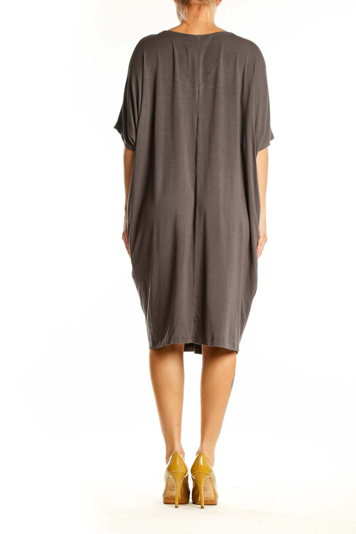 Gray Modal Spandex Shift Dress with side pockets and flowing silhouette, back view