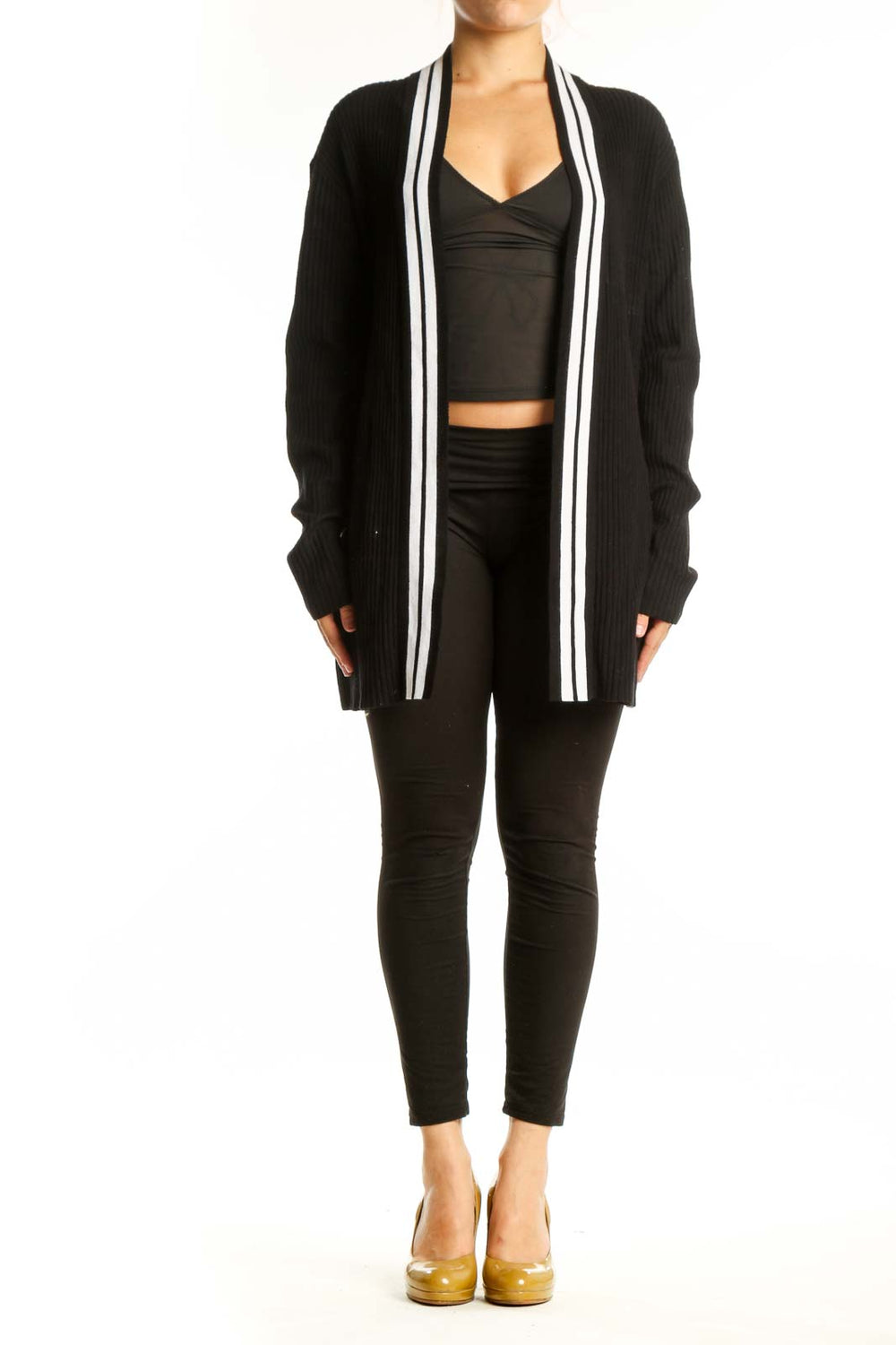 Black ribbed cardigan with white stripe trim worn open over black crop top, front view