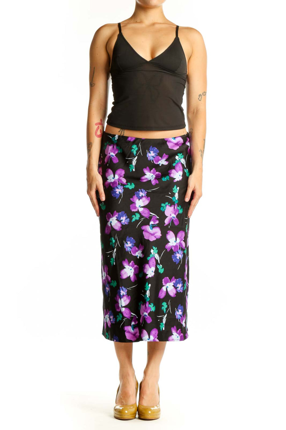 Black floral midi pencil skirt with purple, pink, and teal flower print, front view