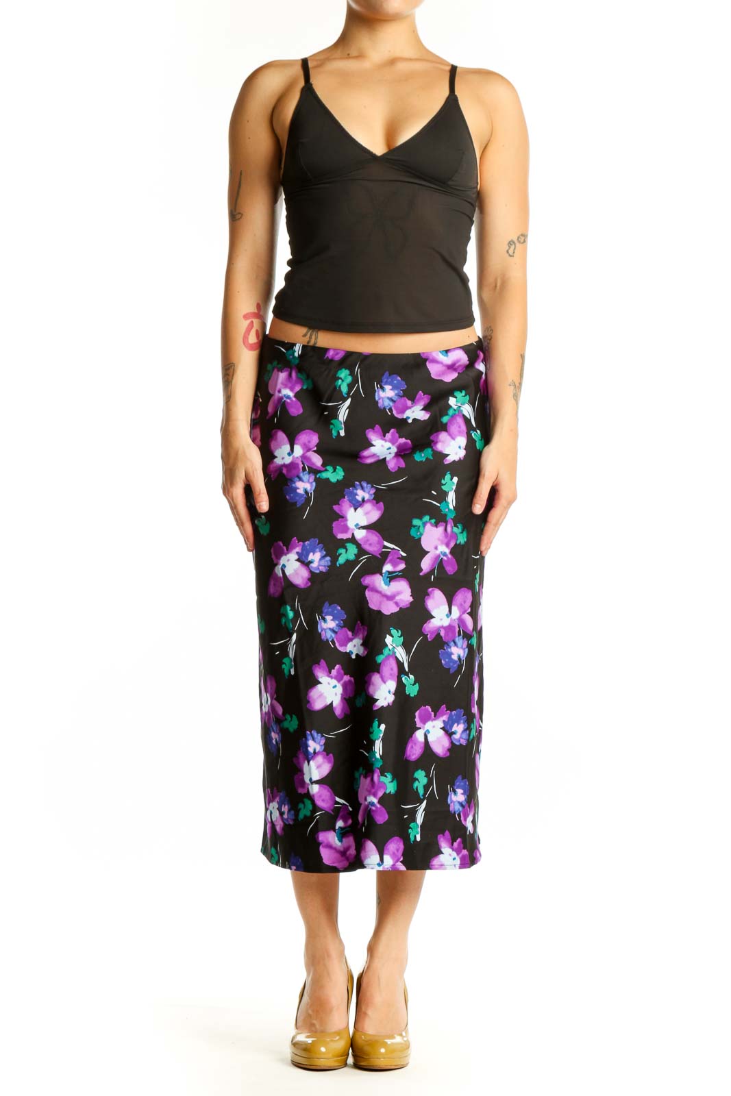 Black floral midi pencil skirt with purple, pink, and teal flower print, front view