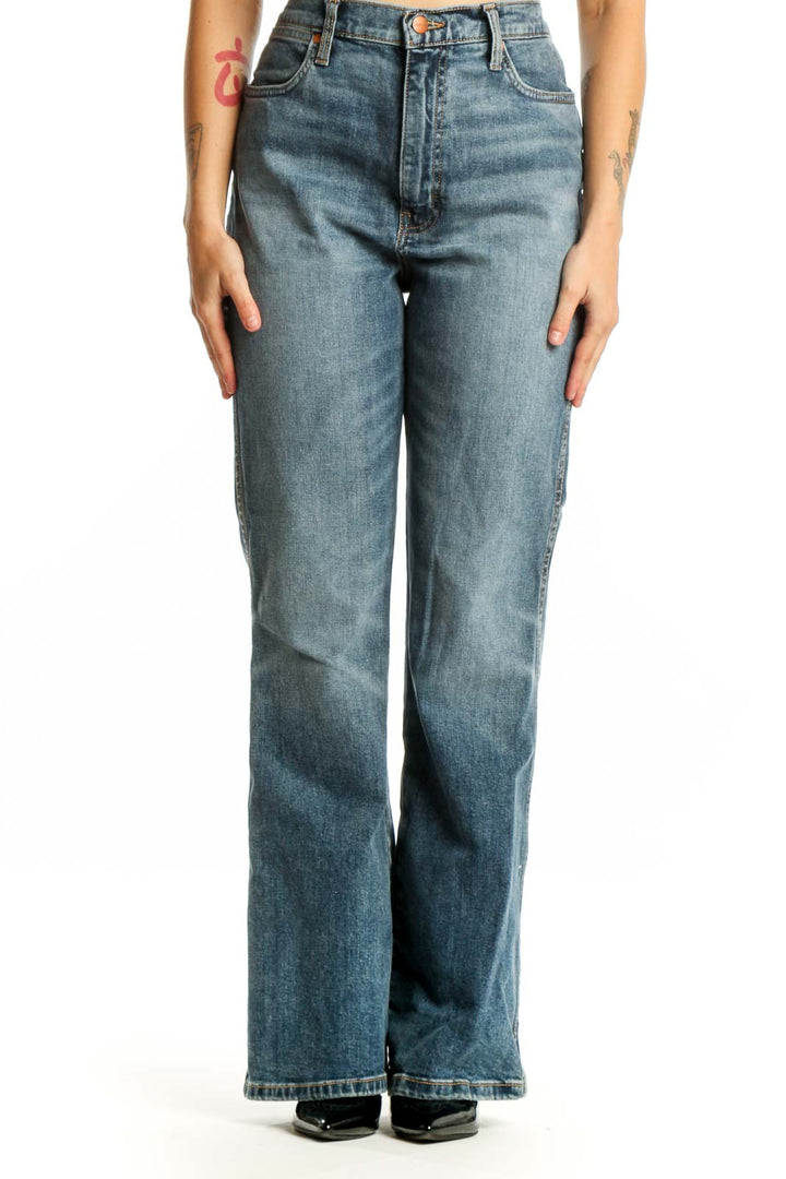 Front view of blue medium wash Wrangler flare jeans with high waist and five-pocket styling