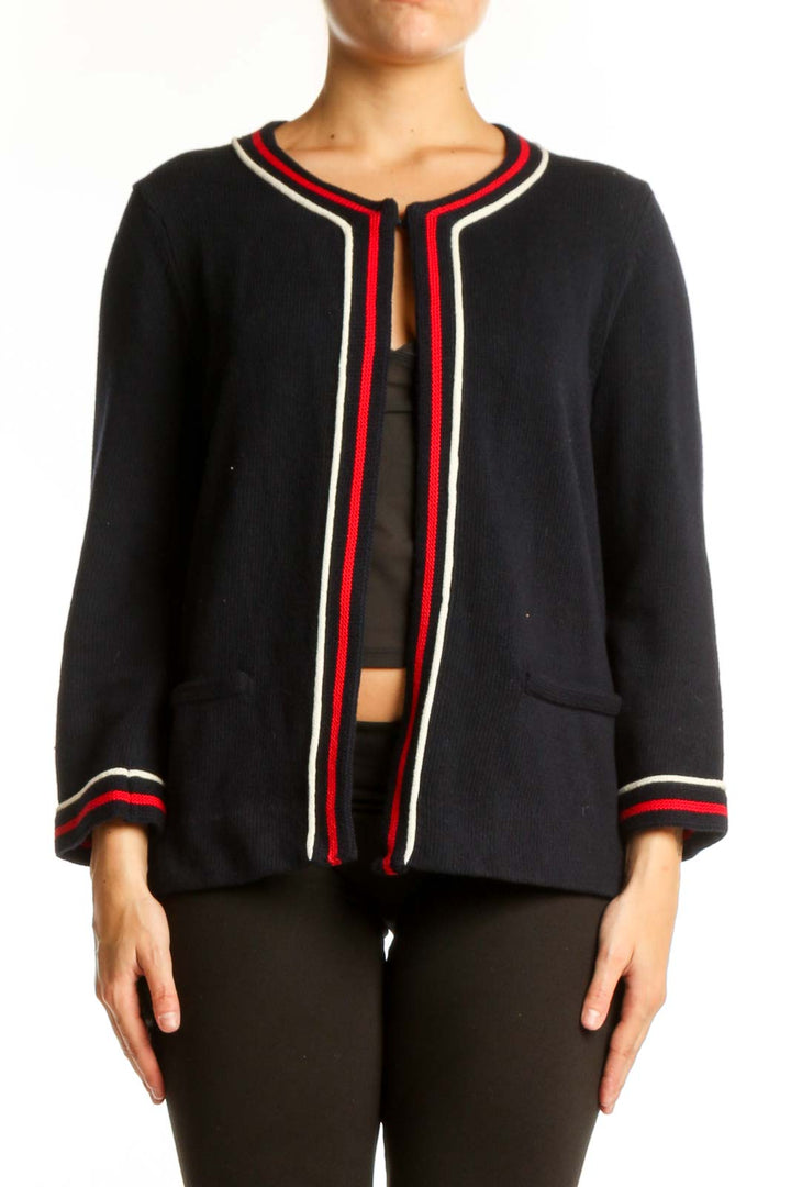 Black cotton cardigan with red, white, and navy striped trim and crew neckline, front view