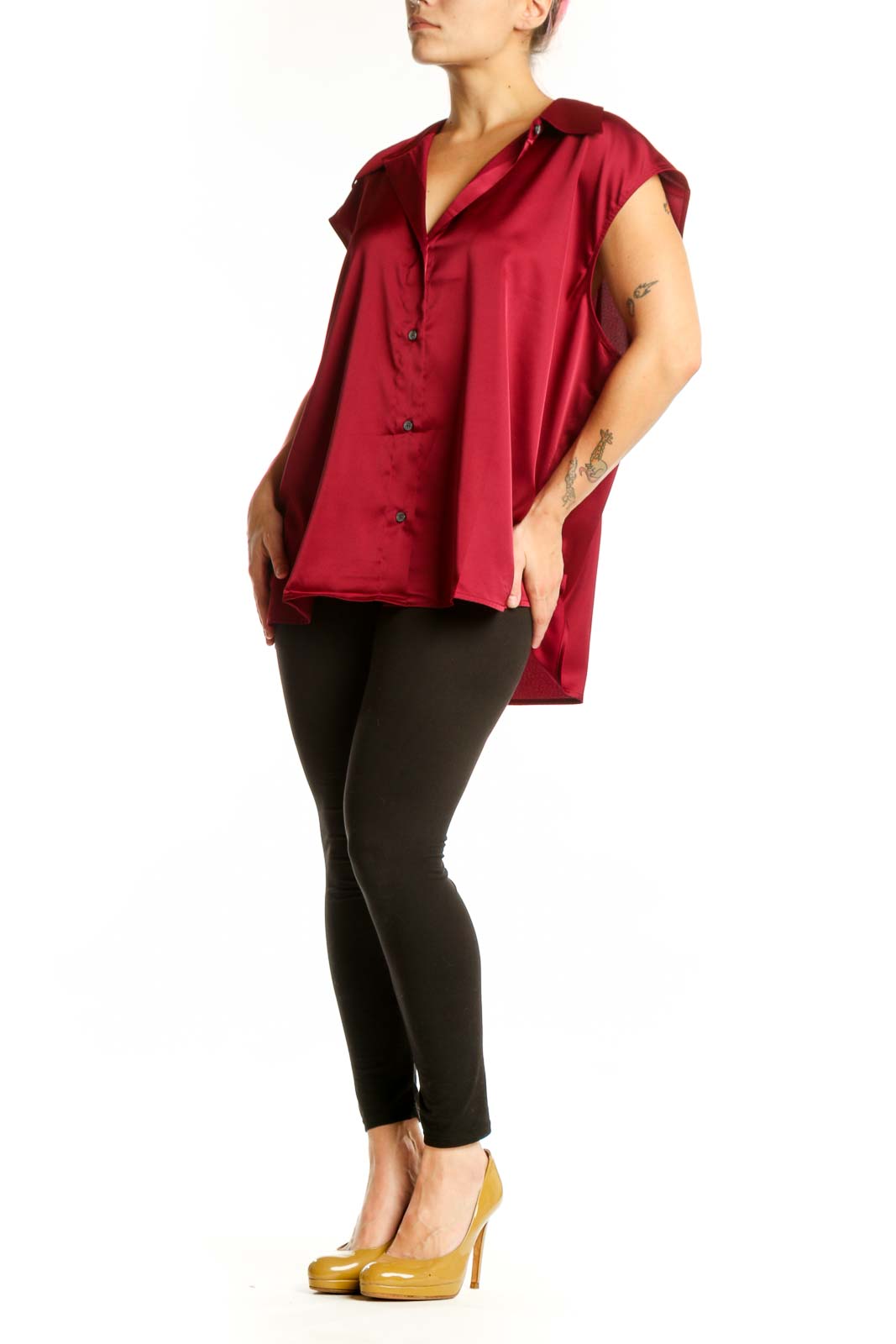 Burgundy button-up cap sleeve blouse with V-neckline, front view on model