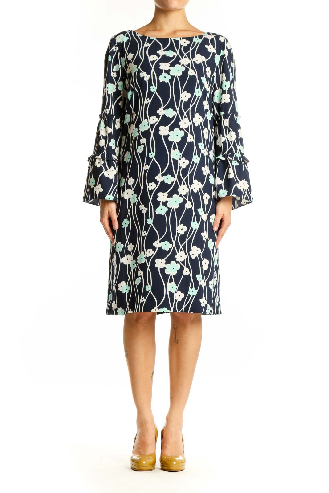 Navy floral canvas dress with bell sleeves and botanical print, front view on model