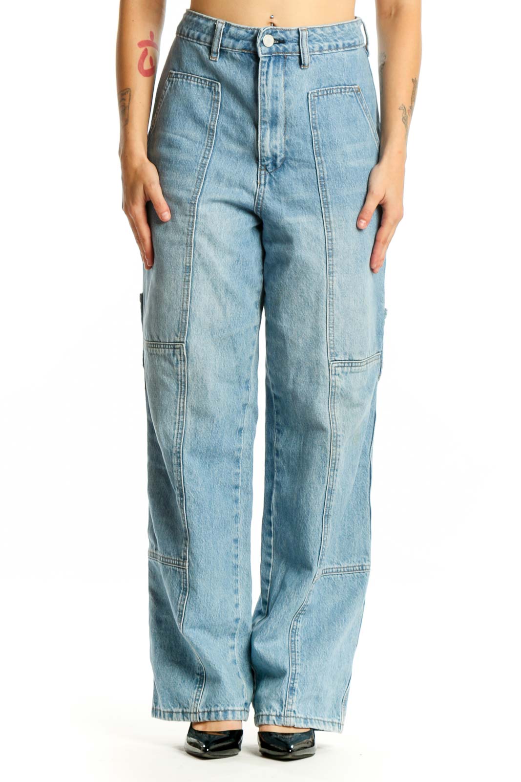 BLANKNYC light wash cargo denim jeans with functional pockets, front view on model