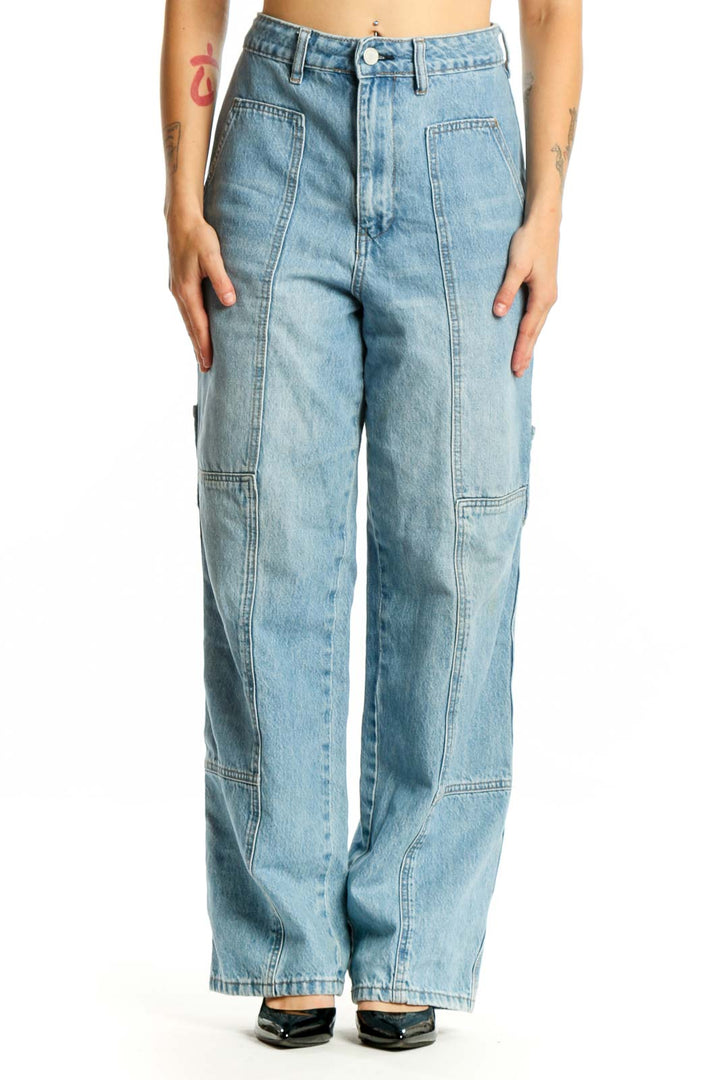 BLANKNYC light wash cargo denim jeans with functional pockets, front view on model