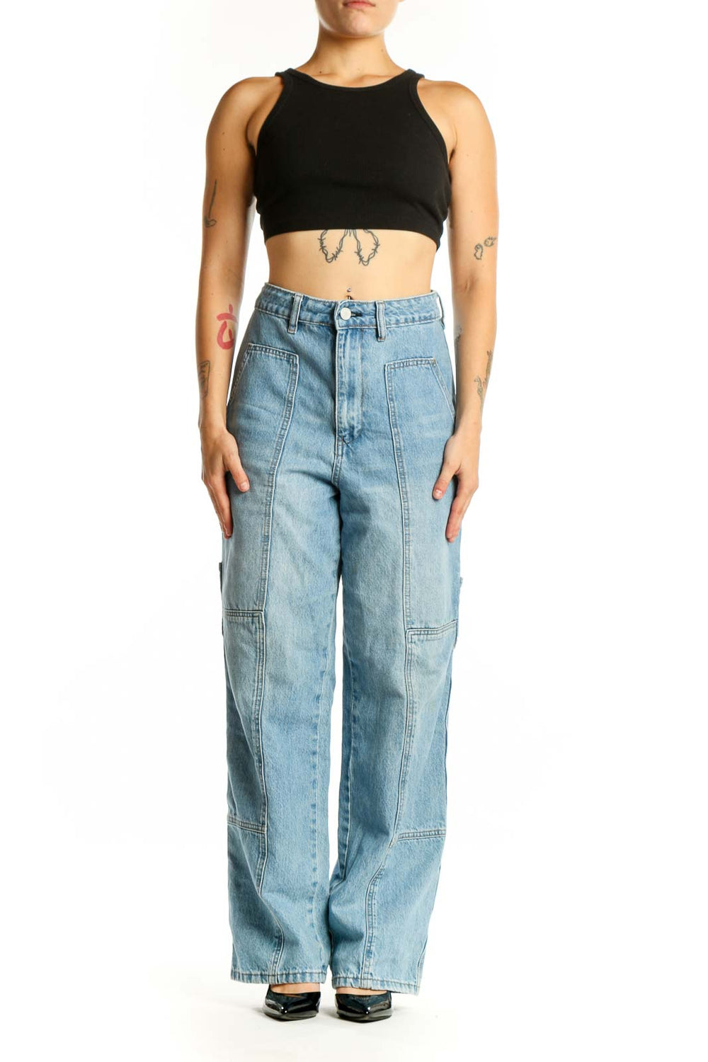 BLANKNYC light wash cargo denim jeans with functional pockets, front view on model