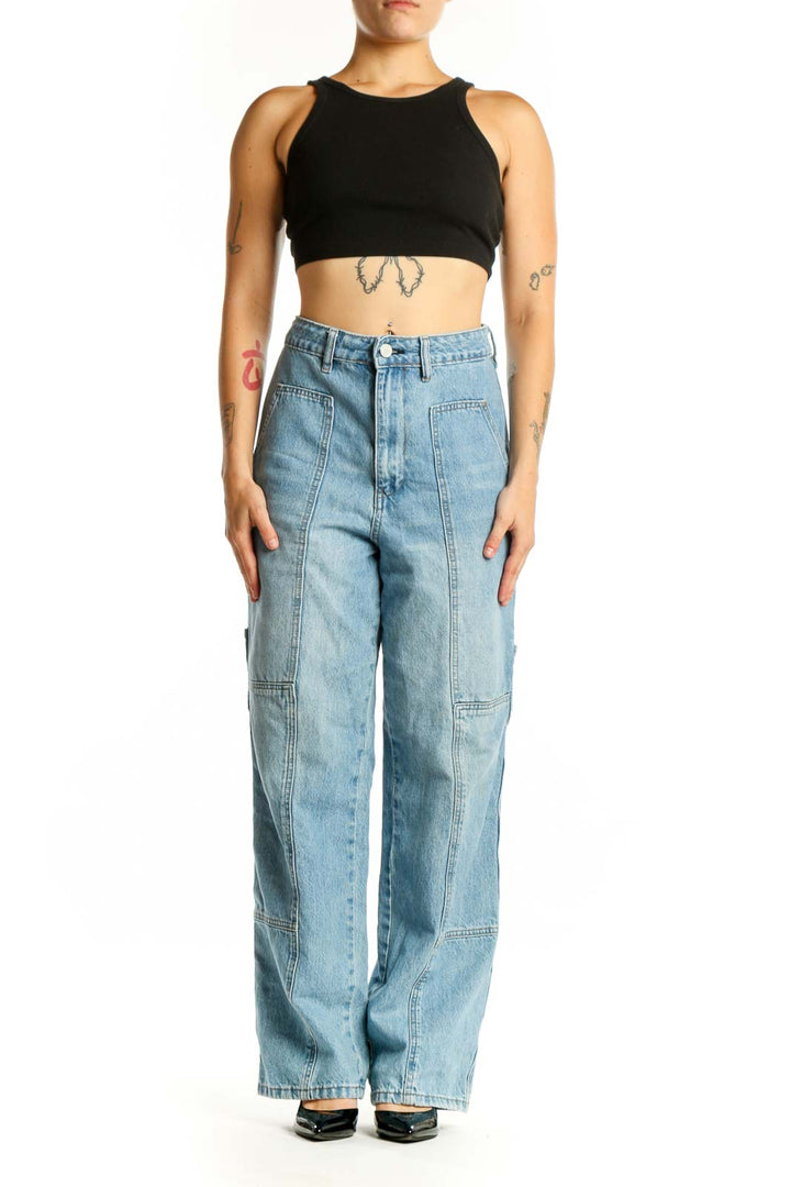 BLANKNYC light wash cargo denim jeans with functional pockets, front view on model