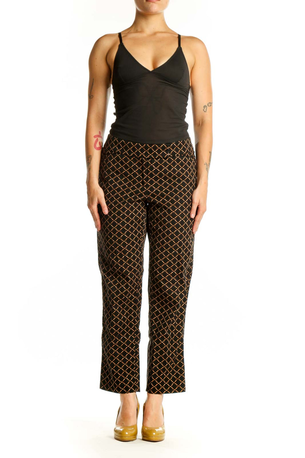 Black and gold geometric print straight leg pants front view