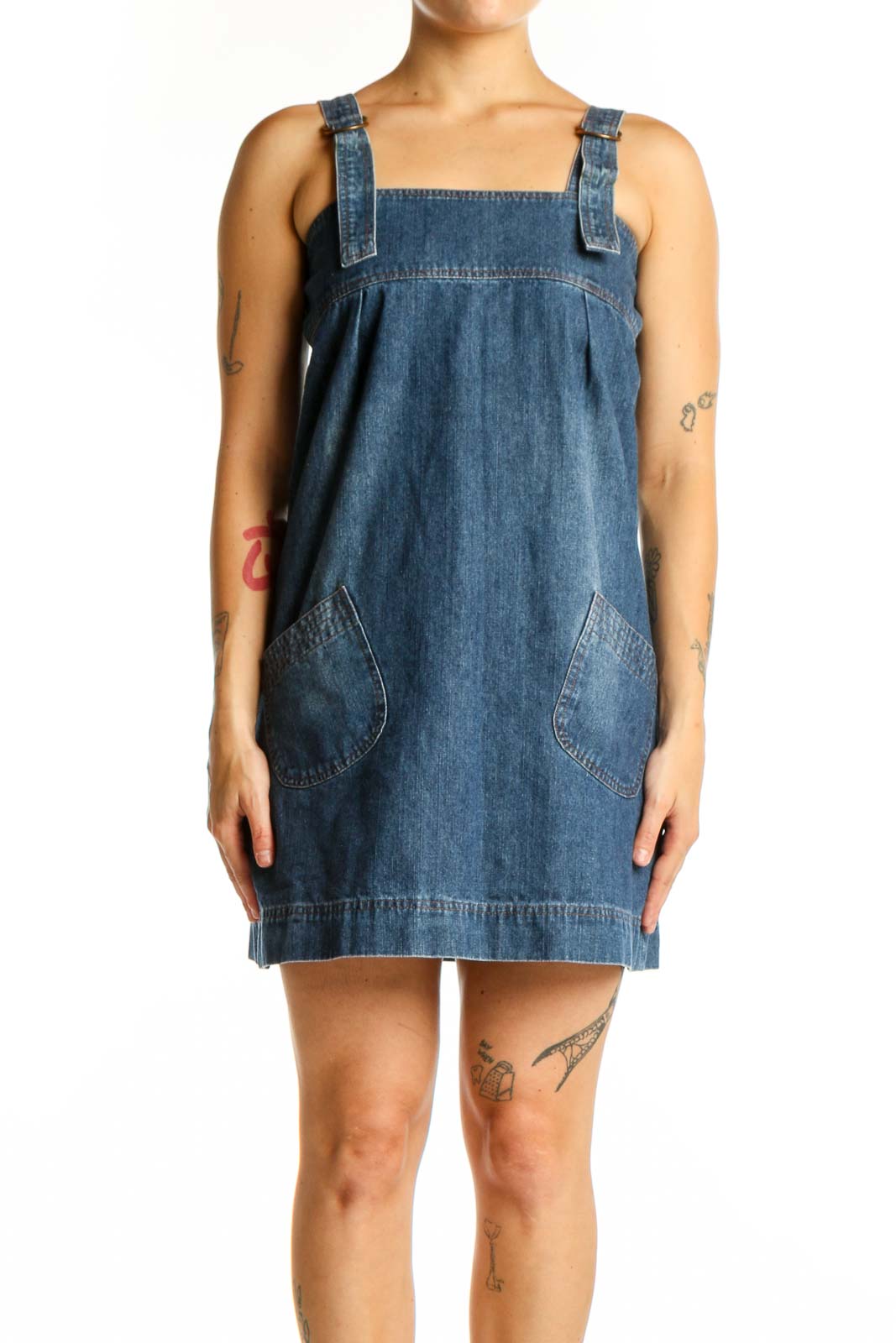 Blue denim sleeveless shift dress with square neckline and patch pockets, front view