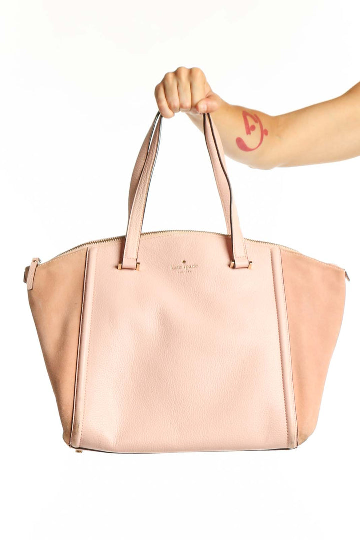 Blush pink leather Kate Spade tote bag with dual handles, front view