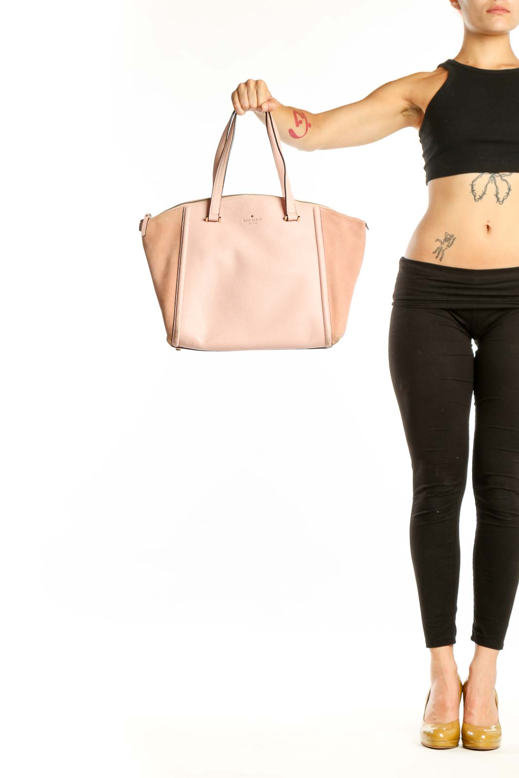Blush pink leather Kate Spade tote bag with dual handles, front view