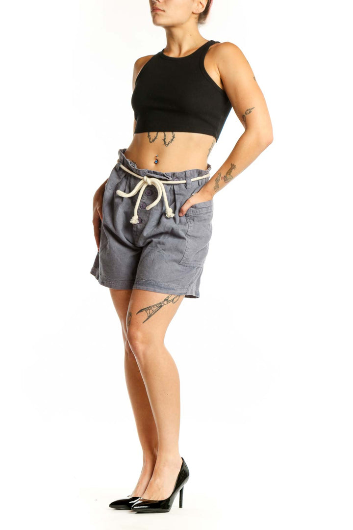 Gray linen cotton drawstring shorts with cream cord detail and front pockets, front view