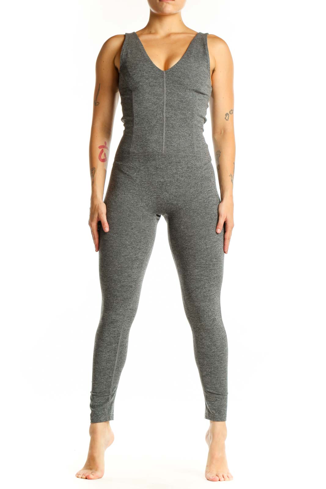 Gray V-neck sleeveless all-in-one jumpsuit front view on model, showing fitted silhouette and full-length design