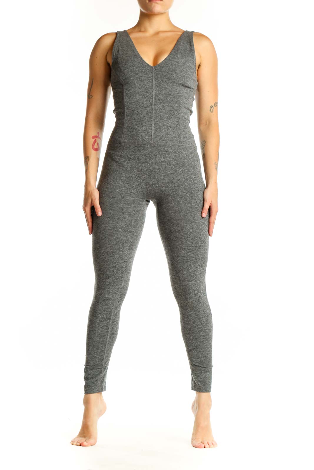 Gray V-neck sleeveless all-in-one jumpsuit front view on model, showing fitted silhouette and full-length design
