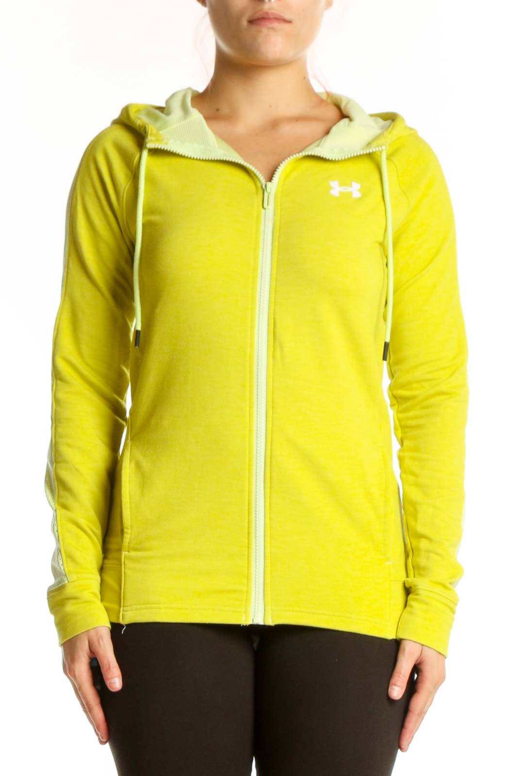 Woman wearing yellow Under Armour zip-up hoodie jacket with cream fleece-lined hood, front view