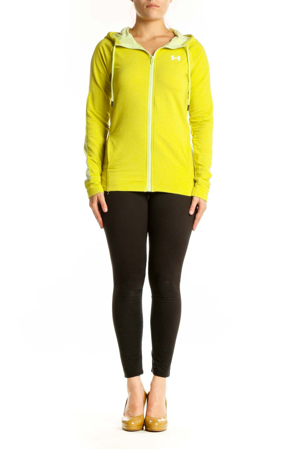 Woman wearing yellow Under Armour zip-up hoodie jacket with cream fleece-lined hood, front view