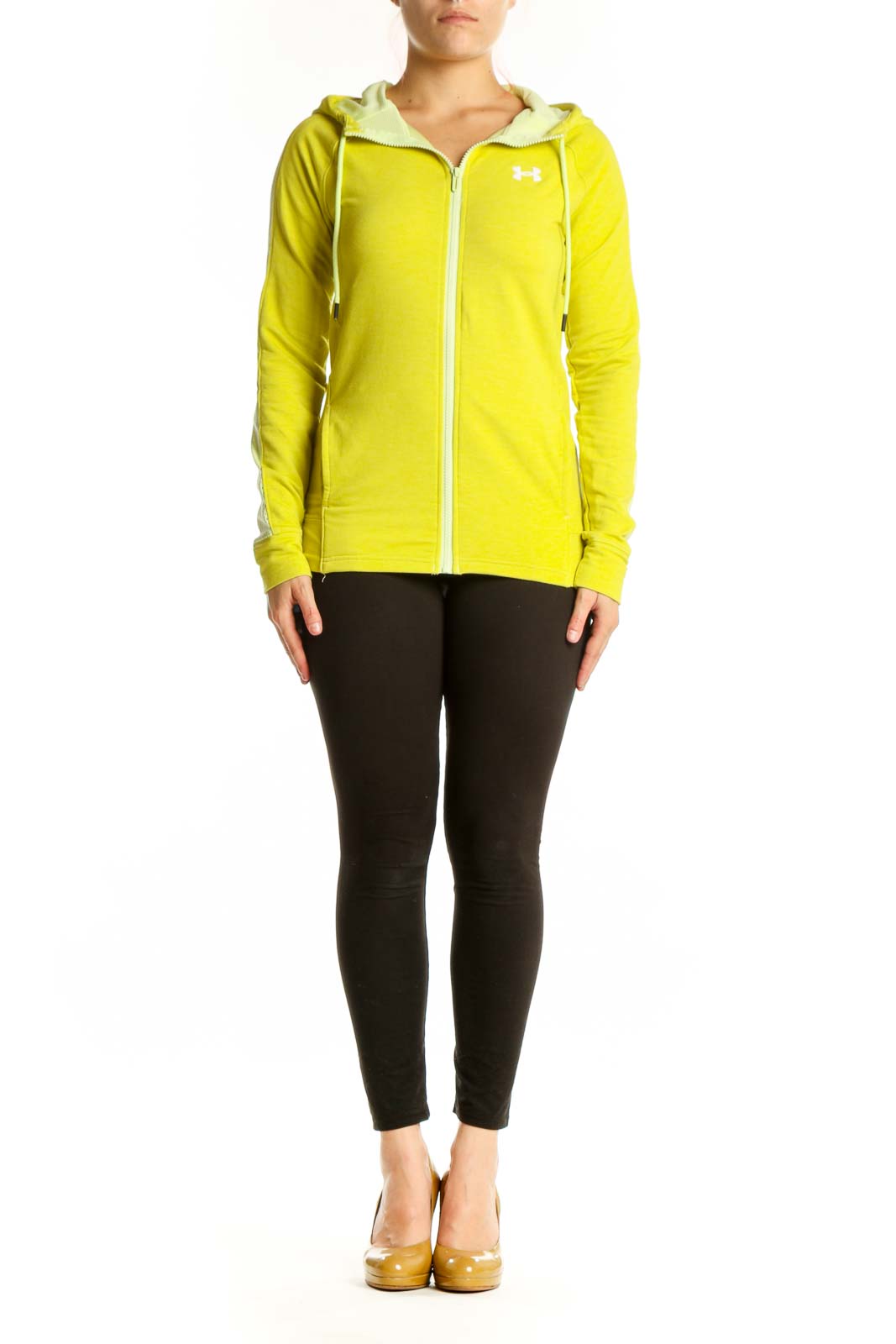 Woman wearing yellow Under Armour zip-up hoodie jacket with cream fleece-lined hood, front view