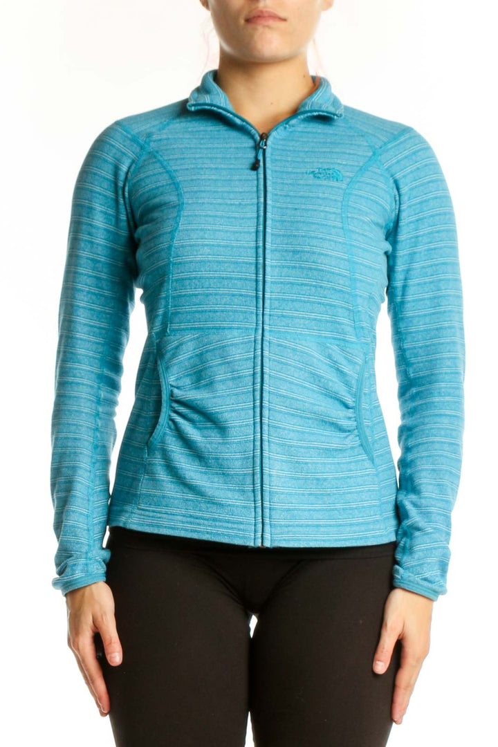 The North Face blue heathered striped hooded zip-up jacket front view on model