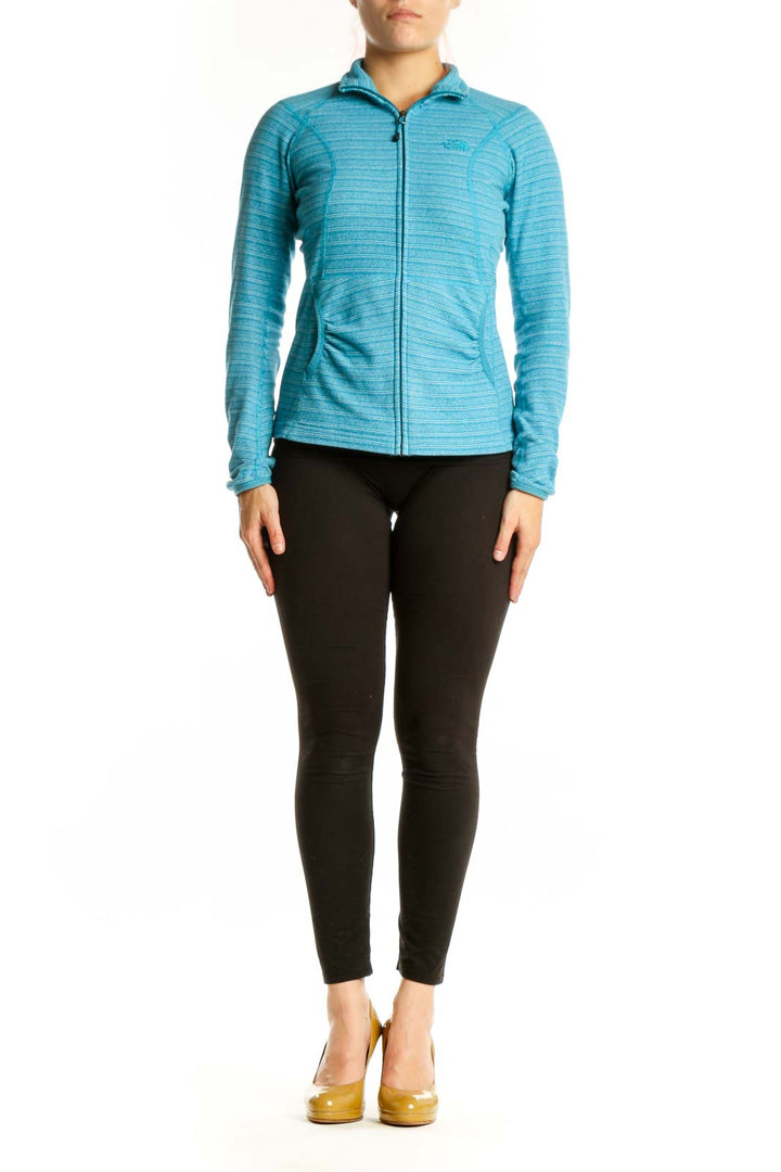 The North Face blue heathered striped hooded zip-up jacket front view on model