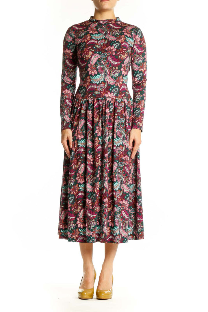 Front view of burgundy floral long sleeve LOFT midi dress with pleated skirt and crew neckline