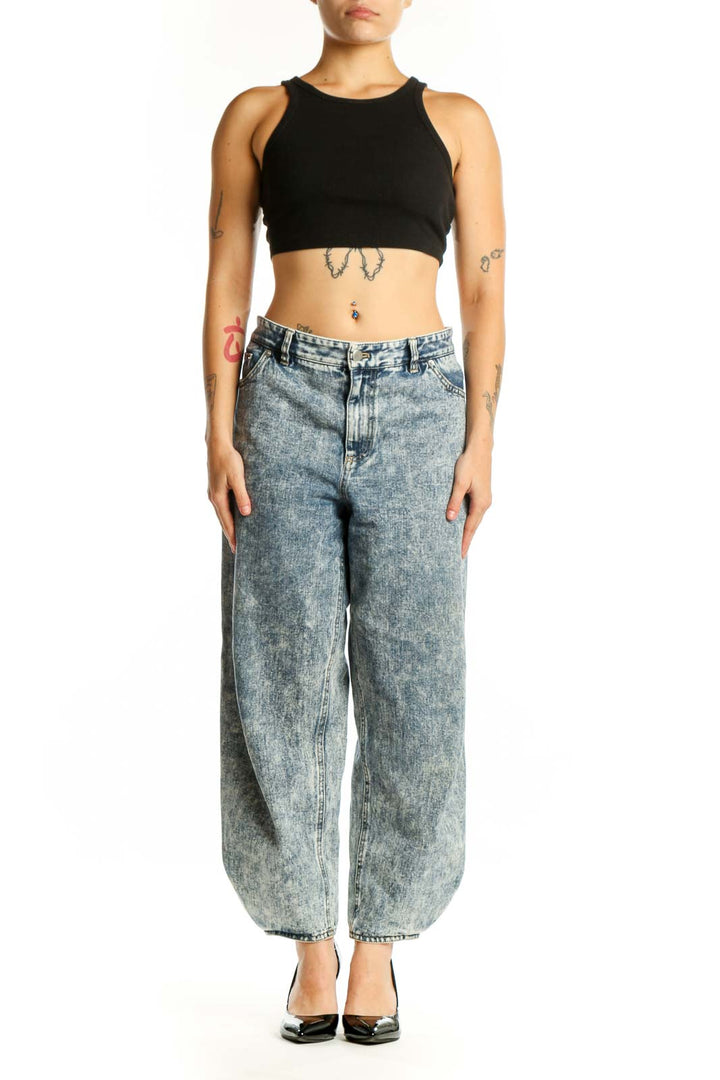 Front view of blue acid wash cropped denim jeans with high-waisted fit and relaxed silhouette