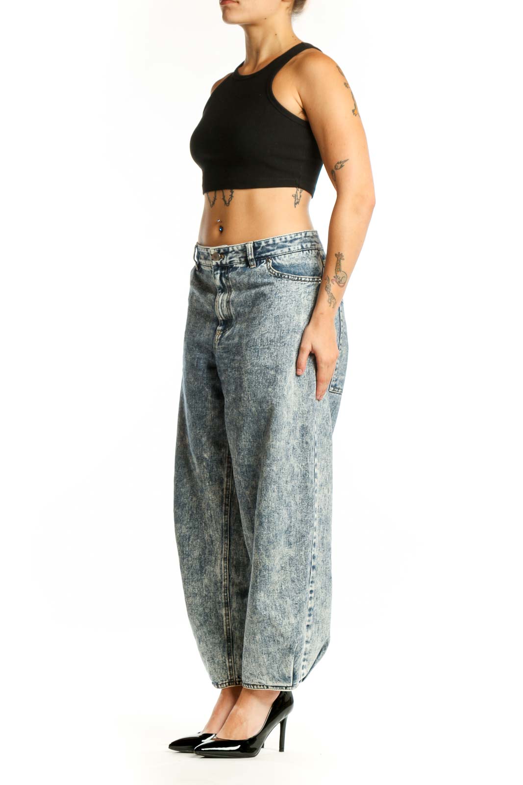 Front view of blue acid wash cropped denim jeans with high-waisted fit and relaxed silhouette