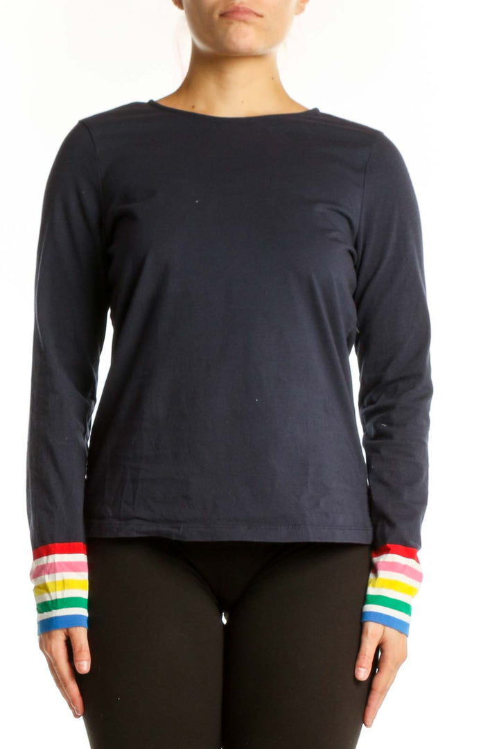 Navy cotton long-sleeve top with rainbow striped cuffs, front view