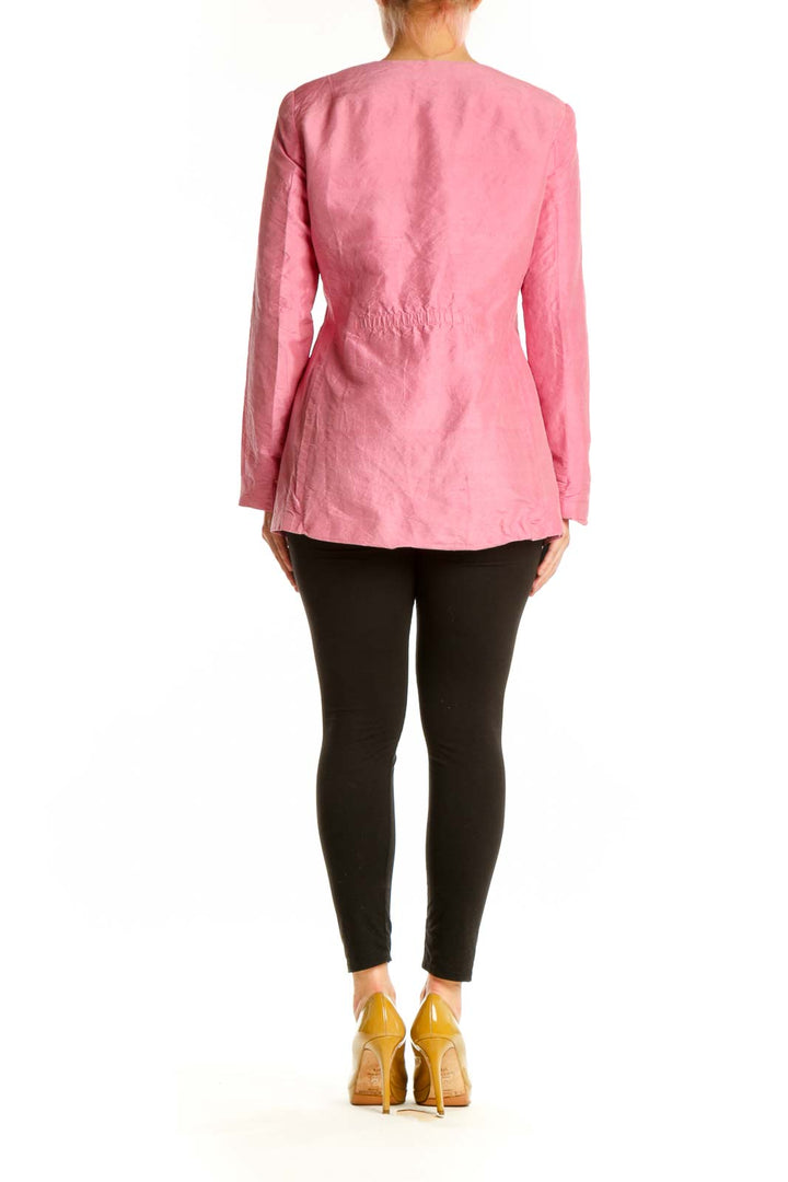 Pink button-front basic jacket by Neiman Marcus, back view on model