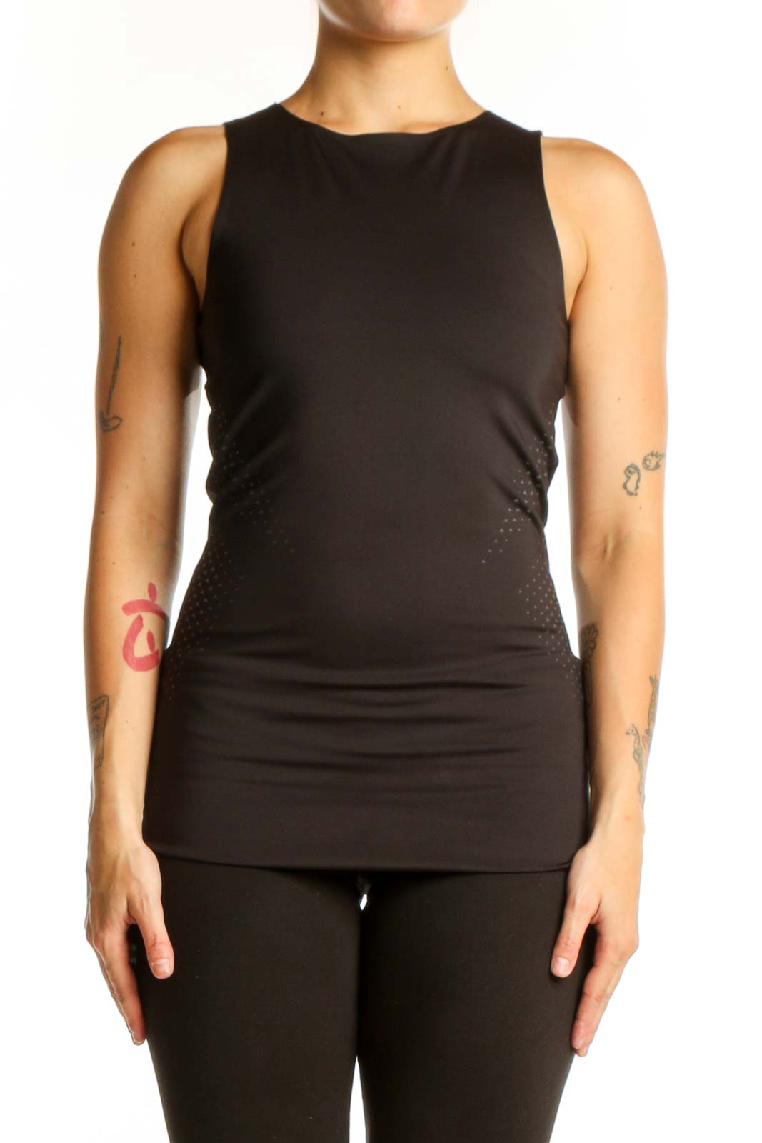 Black Puma athletic tank top front view with mesh side detailing, fitted silhouette on model