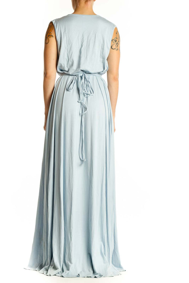 Back view of blue-gray Rachel Pally modal wrap maxi dress showing elegant draping and floor-length silhouette