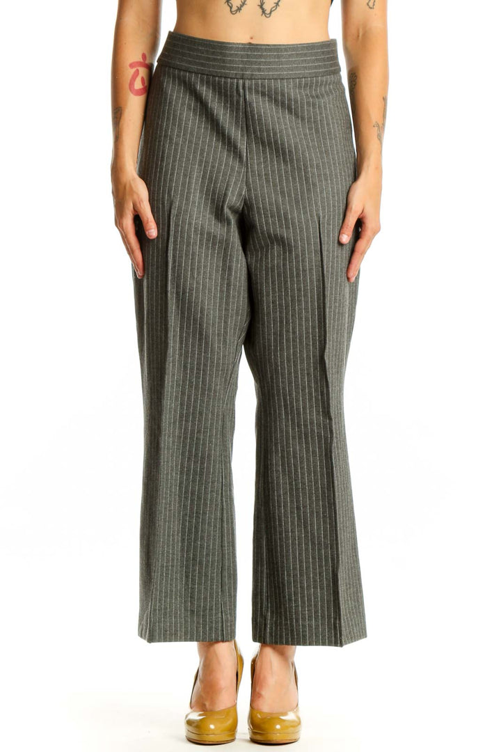 Front view of gray pinstriped cropped flare pants with high waistband and vertical stripe pattern
