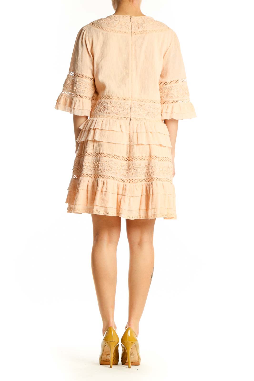 Back view of cream lace ruffle midi dress showing lace panels and tiered ruffle details by Love Sam