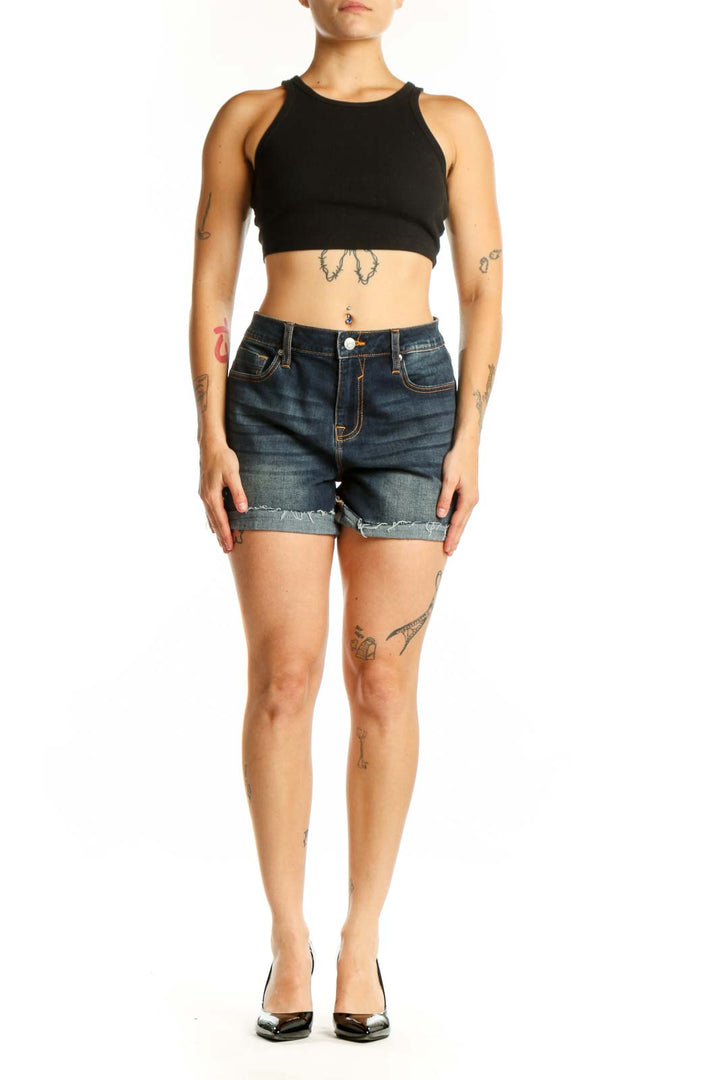 Dark blue denim cut-off shorts with distressed hem and orange stitching, front view