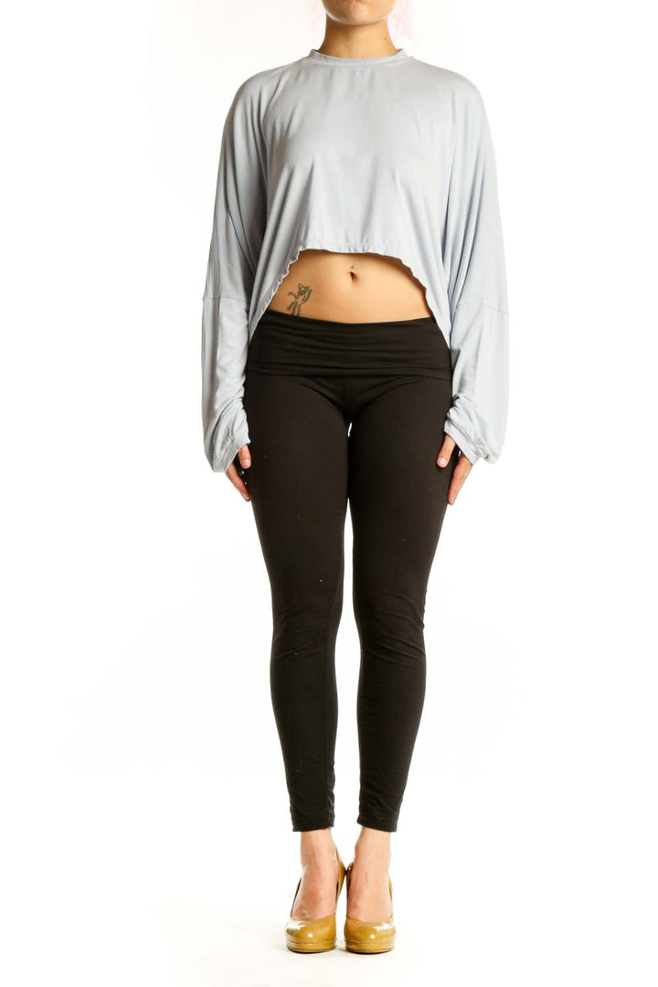 Gray cropped long sleeve top by Skims, front view showing relaxed fit and cropped silhouette