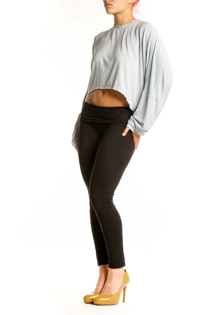 Gray cropped long sleeve top by Skims, front view showing relaxed fit and cropped silhouette