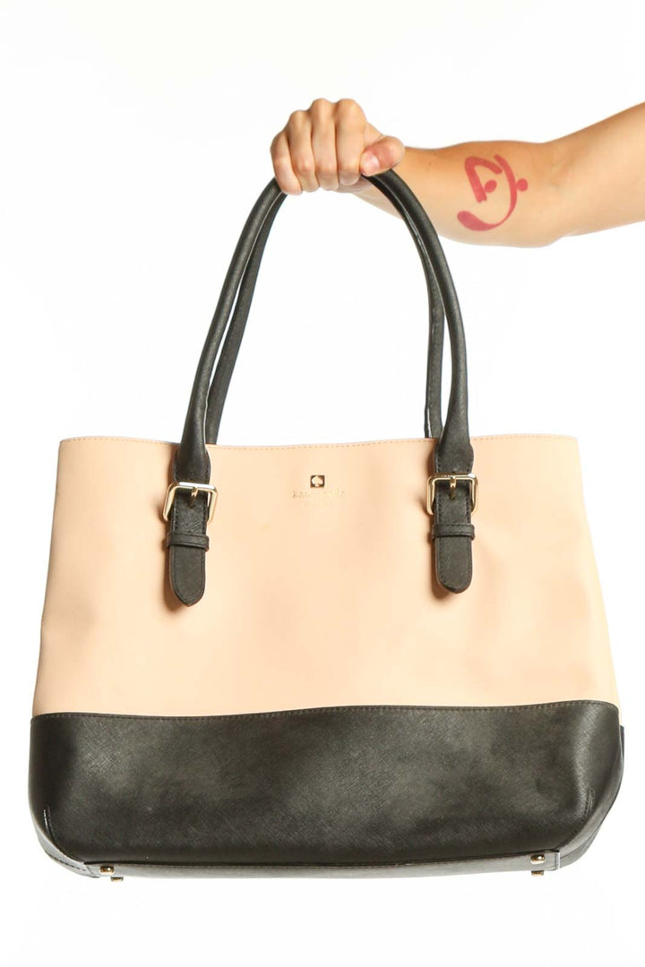 Kate Spade cream and black colorblock shoulder tote bag with dual black leather handles, front view